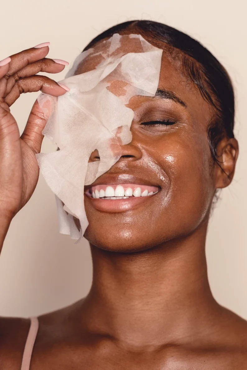 Women-removing-sheet-mask-from-face